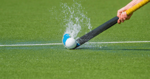 Hockey Ball and Stick with Splashing Water