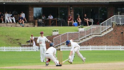 Wicketkeeper Matthew De Oliveira effects a run out of St Alban's top scorer Matthew Ward, while Murray Weyer watches on.