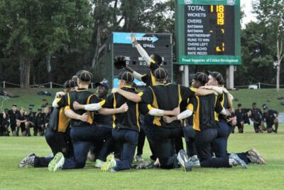 This photo, taken at the Franchise Final of the Coca-Cola T20, reflects the tight-knit nature of the Saints' 1st XI and just how much the whole school had bought into their success, with the supporters taking a knee all along the boundary. 