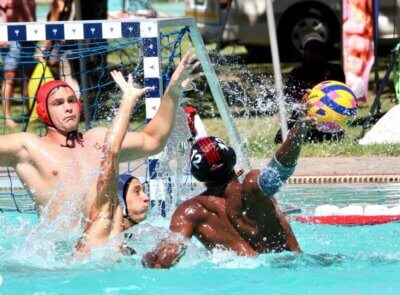 Central Gauteng's Karabo Mamaregane going for goal against KZN keeper, Ross Strauss during the Junior Water Polo Championships in East London. Both players have been included in the SA u18 side. Photo: Shot by Shani Photography