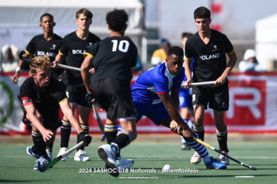 Western Province's Litha Kraai surrounded by several Boland players in the final of the SASHOC National Week final. Photo credits: TeamPhotoSA