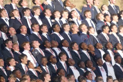 The vigorous support along the side of the field created a wall of sound throughout the contest. 