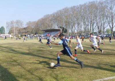 Merchiston launches an attack down the left flank in the final of the Primary Schools' competition against Highbury Prep.