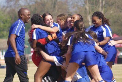 St Mary's DSG joyously celebrates winning the Kearsney Soccer Tournament.