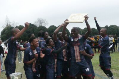 In the fading light, Etham College ecstatically celebrated their victory in the Bowl.