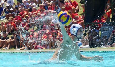 With Gauteng teams forming a wall of red in the background, Western Province's Benjamin Bigara rockets a shot towards the Central Gauteng goal. Photo: Brad Morgan.