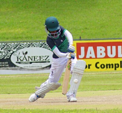 Dr John L Dube opening batter Enthle Mkhalipa goes on the drive in the KZN final of the Schools SA20 at the Pietermaritzburg Oval. Photo: Brad Morgan.