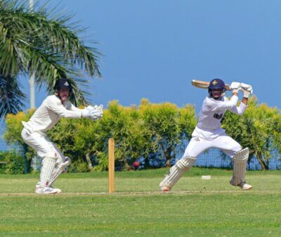 Northwood captain Kyle White cuts while watched by Hilton captain Ben Hockly. White score 50 for the Knights in a seven-wicket win over Hilton.