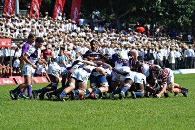 Maritzburg College boys watch on from Basher Ridge as the Red, Black, and White pack down against Northwood's Knights. Photo: Maritzburg College on Facebook.