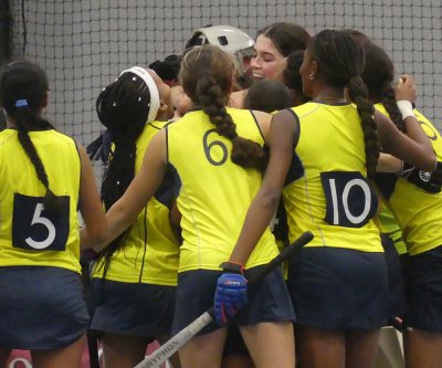 Southern Gauteng goalkeeper Charlie Dalling was embraced by her teammates after the final whistle sounded. She had played a big role in keeping KZN Coastal A scoreless with an exceptional performance. Photo: Brad Morgan. 