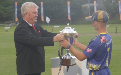 Clifton College's Executive Headmaster Adam Rogers presented Waterkloof captain Franco Schmidt with the magnificent Clifton Centenary Cup. Photo: Brad Morgan. 