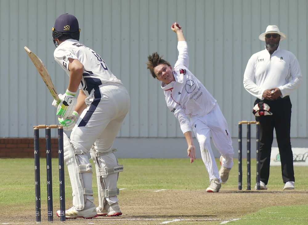 Looking like a left-arm version of Proteas' fast bowler, Gerald Coetzee, before he took to wearing a headband, Eli van Jaarsveld sends down a delivery to Westville opening batsman, Ewan du Toit. Photo: Brad Morgan.