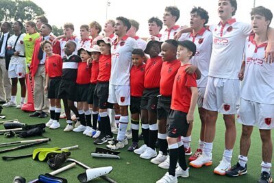 The Clifton College 1st XI, ball boys, and thei supporters celebrate an impressive victory. Photo: Laurie Smith.