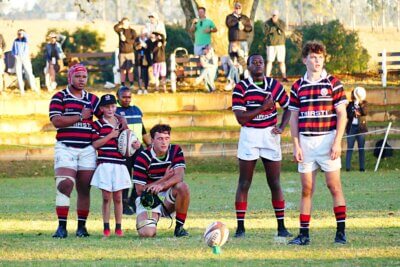 Dom du Toit lines up a penalty kick with time up on the clock and Maritzburg College trailing DHS by two points. He made it, and College celebrated a gutsy 18-17 win. Photo: Brad Morgan.
